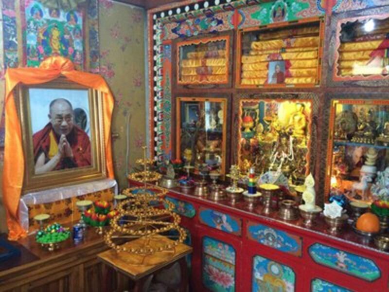 The Dalai Lama's photo is displayed on a shrine, Feb. 19, 2015.