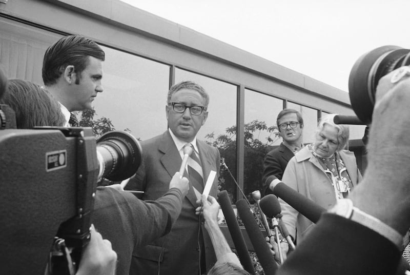 Presidential advisor Henry Kissinger tells newsmen at the “Western White House” in San Clemente, Calif., that the Cambodia issue is being discussed with Chinese envoy Huang Chen, July 6, 1973. (AP)