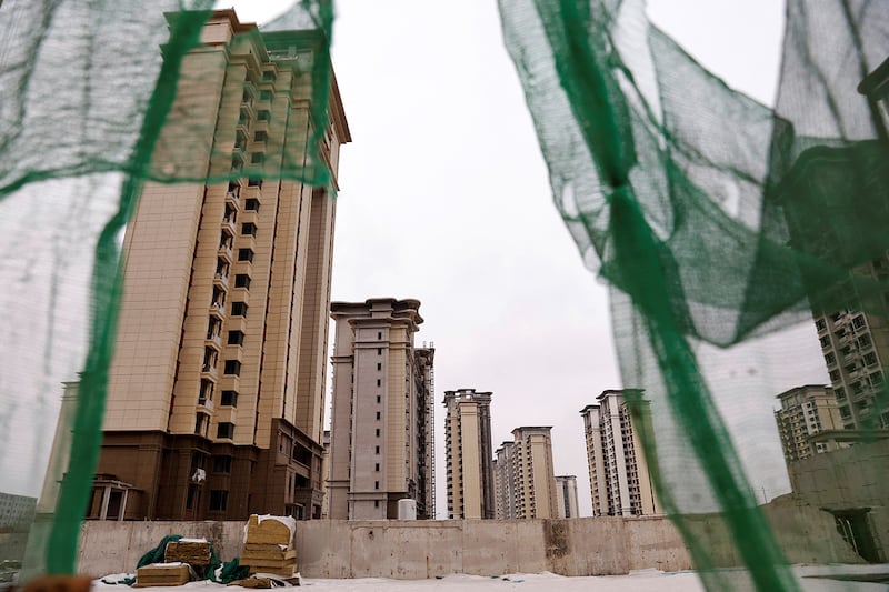 Unfinished residential buildings developed by the China Evergrande Group are seen on the outskirts of Shijiazhuang, Hebei province, China, on Feb.1, 2024.