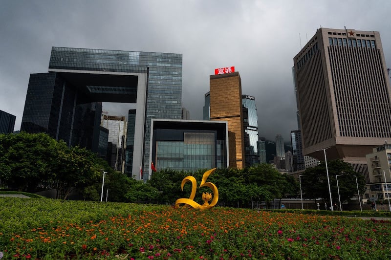 An installation marking the July 1 25th anniversary of Hong Kong's handover from Britain to China is seen in the Admiralty district of Hong Kong on June 12, 2022. Credit: AFP