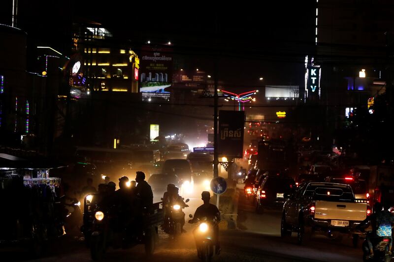 Traffic passes through Golden Lions roundabout in Sihanoukville, Cambodia, May 19, 2019. Reuters