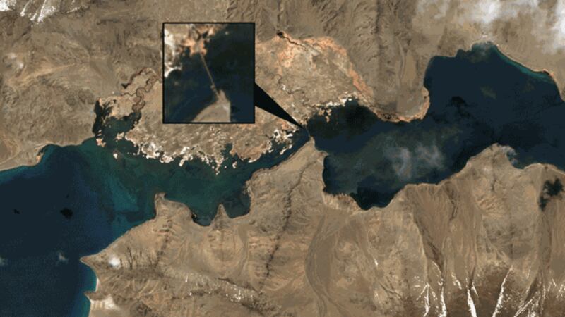 This satellite image with a detail inset shows China's bridge over Pangong Lake on the border with India and China, April 24, 2022. Credit: EO Browser, Sinergise Ltd.