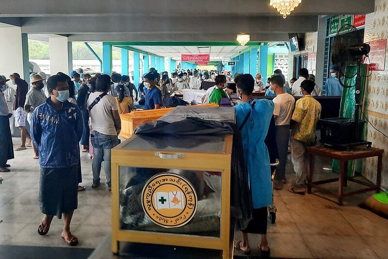 002Funeral coffins lining up for cremation at Yayway crematorium in Yangon on Jul 12_Credit Bo Sein.jpeg