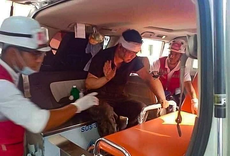 A-chinese-official-from-Hlaing-Tharyar-being-treated-by-medics-on-03-14-2021-by-CJ.jpg