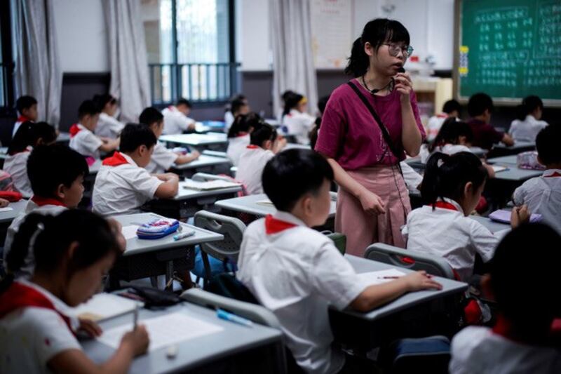 中国大陆小学校景。（路透）