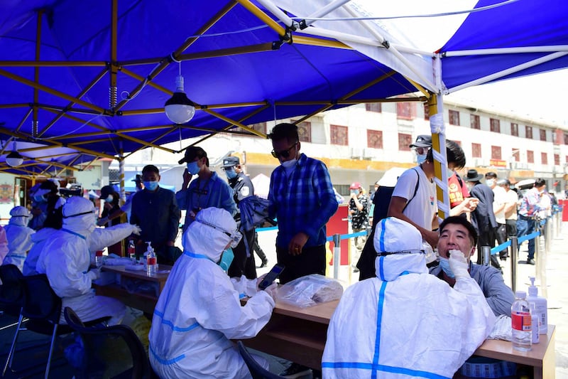 Residents undergo mass testing following a COVID-19 outbreak in Lhasa, Tibet Autonomous Region, China, Aug. 9, 2022. Credit: CNS via Reuters