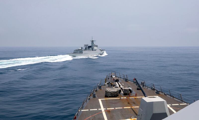 The USS Chung-Hoon observes a Chinese navy ship conduct what it called an "unsafe” Chinese maneuver in the Taiwan Strait, Saturday, June 3, 2023, in which the Chinese navy ship cut sharply across the path of the American destroyer, forcing the U.S. ship to slow to avoid a collision.