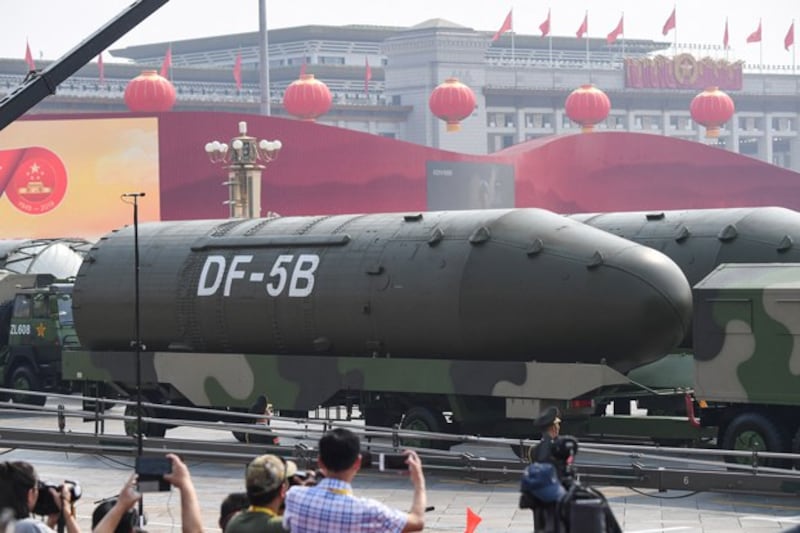 Chinese military vehicles carrying DF-5B intercontinental ballistic missiles participate in a parade at Tiananmen Square in Beijing, Oct. 1, 2019. (Greg Baker/AFP)