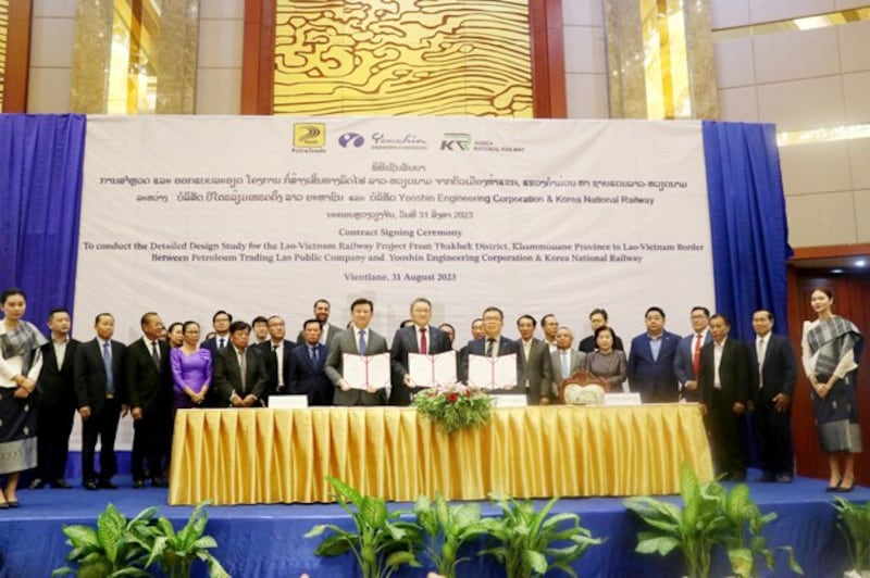 Representatives of companies involved in the Laos-Vietnam railway sign the contract for the project in Vientiane, Laos, Aug. 31, 2023. Credit: Vientiane Times