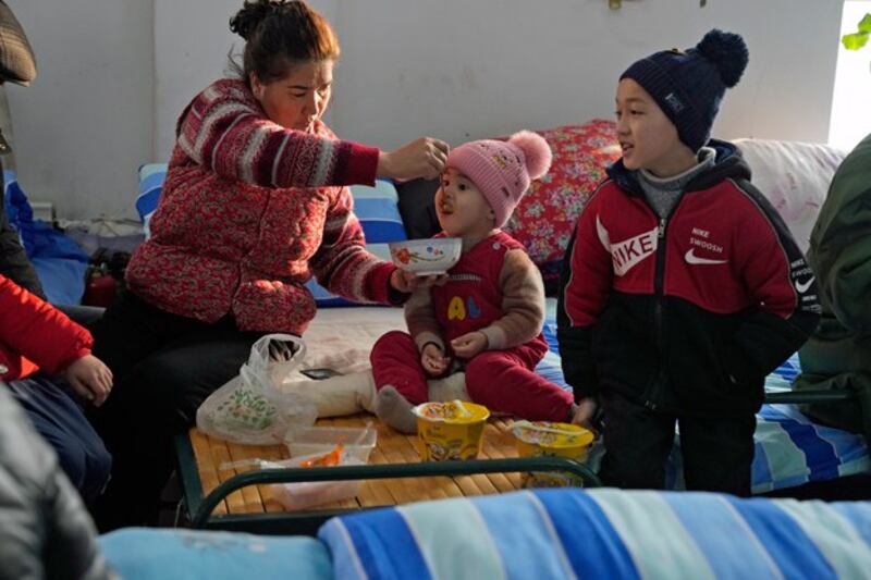 Residents stay in a temporary shelter in Yamansu township, Aksu prefecture, in northwestern China's Xinjiang region on Jan. 24, 2024. (Ng Han Guan/AP)