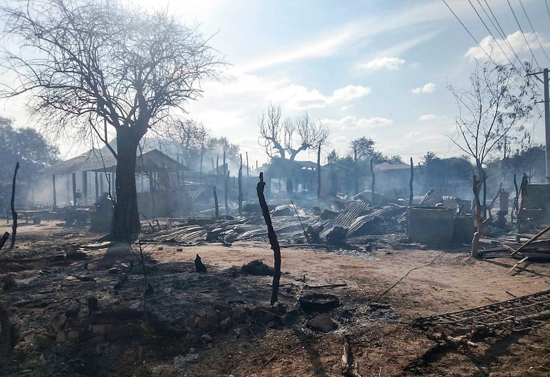 The smoldering remains of Kebar village in Sagaing region's Ayeyarwaddy township, Dec. 13, 2021.