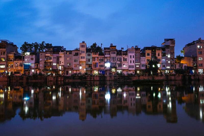 While the tube house is found everywhere along Hanoi's streets, there is pressure from developers and urban planners to separate residences and business. (AFP)