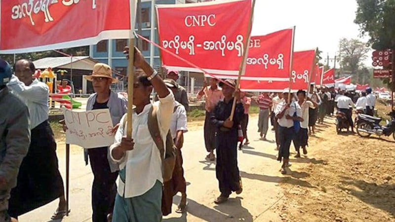 Myanmar protesters demand compensation for land confiscated by the Chinese and Myanmar operators of a pipeline project in Ann township, western Myanmar's Rakhine state, March 22, 2018.