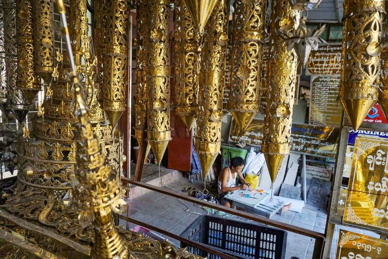 Pieces designed for pagodas hang in a shop waiting for a buyer. (Myo Min Soe/RFA)