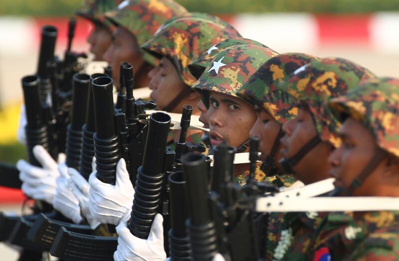 Myanmar junta forces march during a parade to commemorate Myanmar's 78th Armed Forces Day in Naypyitaw in March 2023. Credit: Aung Shine Oo/AP