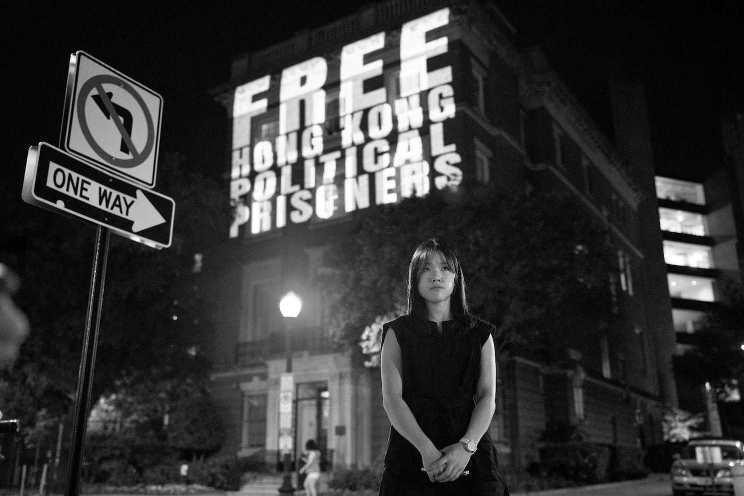 Hong Kong democracy activist Frances Hui stands outside the Hong Kong Economic and Trade Office in Washington, D.C., during a protest to mark World Press Freedom Day, May 2, 2024.