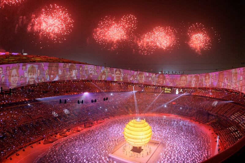 Fireworks explode over the National Stadium during the opening ceremony for the Beijing 2008 Olympics in Beijing on Aug. 8, 2008. Credit: Associated Press