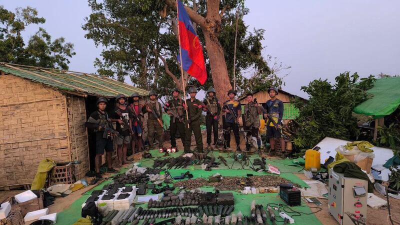 Arakan Army forces display weapons seized after they captured a junta military camp in Pe Yan Tuang village, Maungdaw township, Rakhine state, on Feb. 19, 2024. (AA Info Desk)