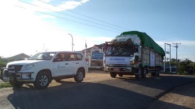 A UNHCR convoy carries relief supplies to refugees in Chin state, July 19, 2021. UNHCR