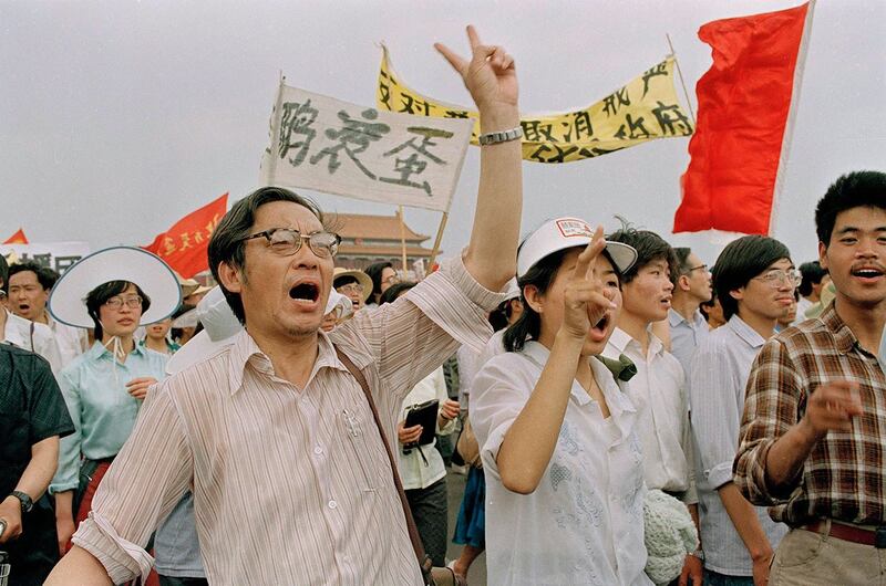 1989年5月23日，参加游行的北京市民。（美联社）