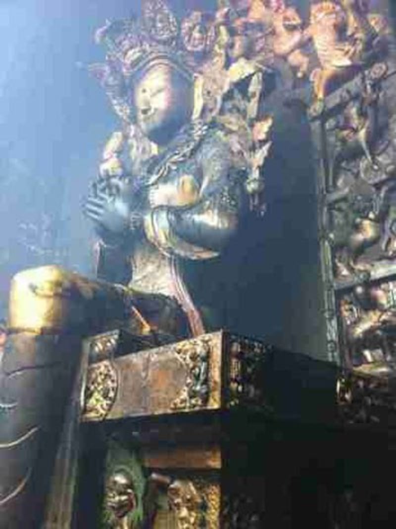 A damaged statue in the main hall of the monastery. Credit: RFA listener