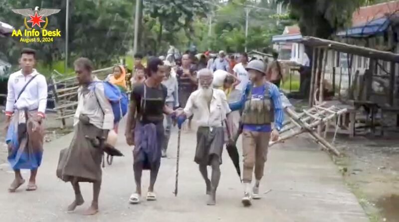 A screenshot from a video documents the Arakan Army rescuing Muslim elders, women, men and children from the Bo Hsu Village of Maungdaw Township, Aug. 8, 2024. (AA Info Desk via Telegram)