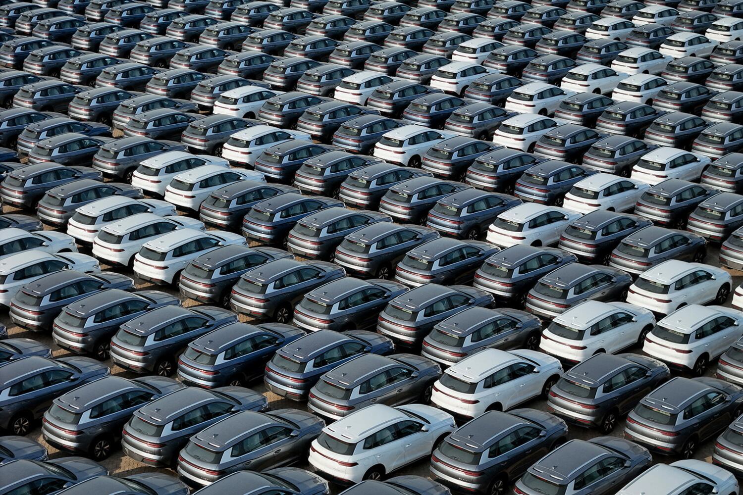 BYD electric cars for export wait to be loaded onto a ship at a port in Yantai, in China's Shandong province, April 18, 2024.