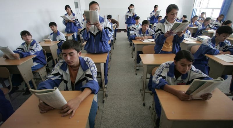 Uyghur students study at a bilingual middle school in Hotan, Xinjiang, in a file photo. AFP