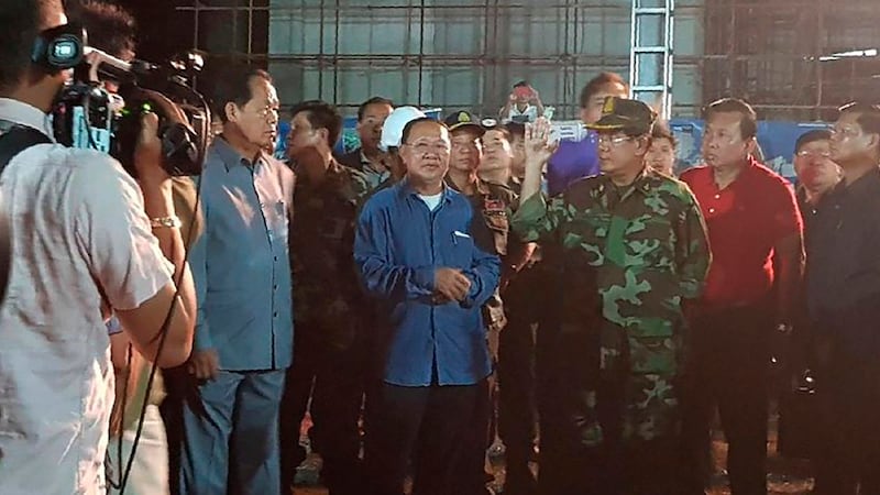 Cambodia's Prime Minister Hun Sen, third from right, visits the site of a building collapse in Sihanoukville, June 23, 2019. Credit: Preah Sihanouk provincial authorities via AP