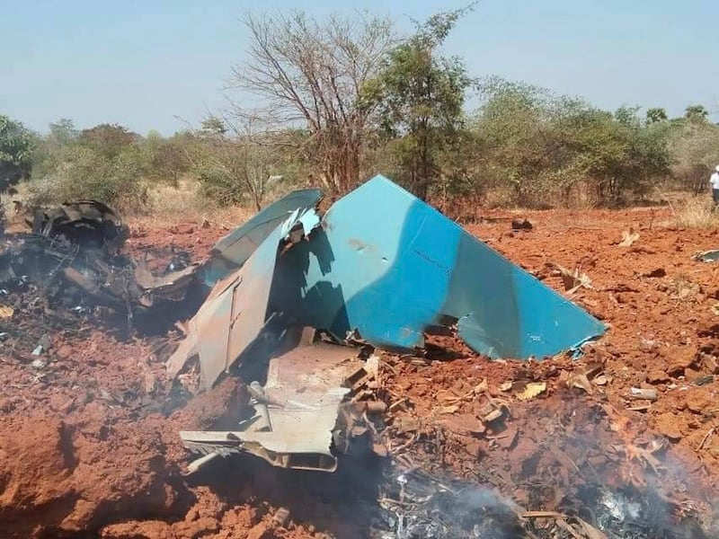 Debris from a crashed Myanmar air force MiG-29 fighter jet smolders near Kyo Wun village, Salin township in Magway region, Feb.29, 2024. (Salin People's Defense Force via AP)