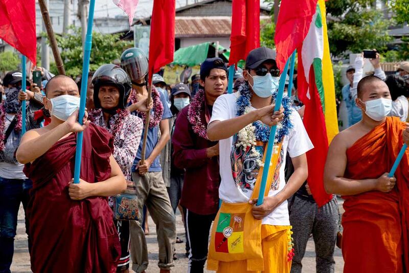 Buddhist monks and protesters march on Tuesday in Mandalay. (AFP/Anonymous source)