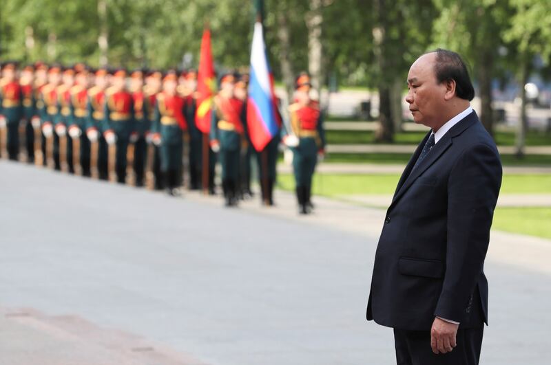 A file photo showing then-Vietnamese Prime Minister Nguyen Xuan Phuc at a wreath-laying ceremony at the Tomb of the Unknown Soldier by the Kremlin wall in central Moscow, Russia May 23, 2019. Phuc is now president of Vietnam. Credit: Reuters