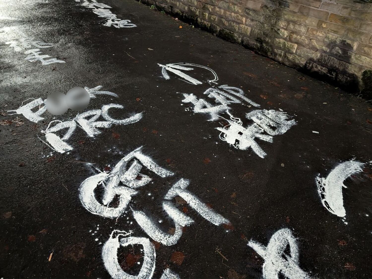 Anti-Communist Party slogans outside the Chinese Consulate in Manchester, Dec. 28, 2024.