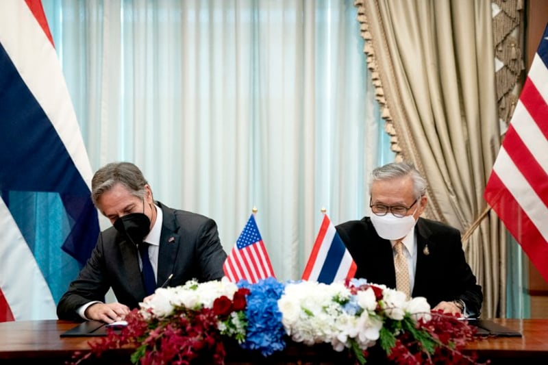 U.S. Secretary of State Antony Blinken (left) and Thai Foreign Minister Don Pramudwinai sign a memorandum of understanding at the Thai Ministry of Foreign Affairs in Bangkok, July 10, 2022. Credit: Stefani Reynolds/Pool via AP