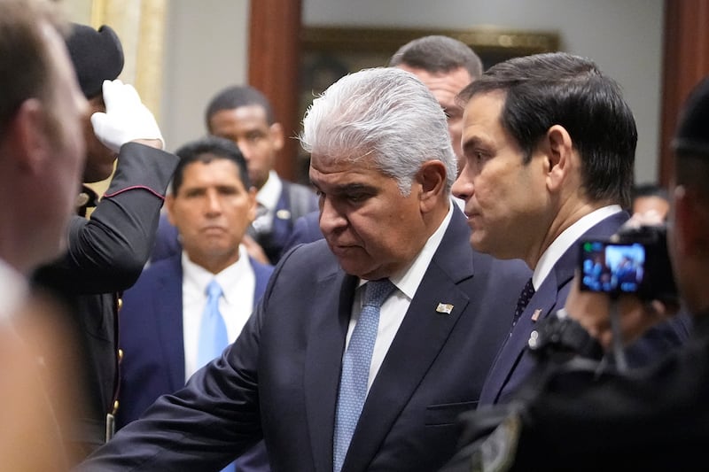 Panama's President Jose Mulino, left, and U.S. Secretary of State Marco Rubio arrive for a meeting at the presidential palace in Panama City, Feb. 2, 2025.