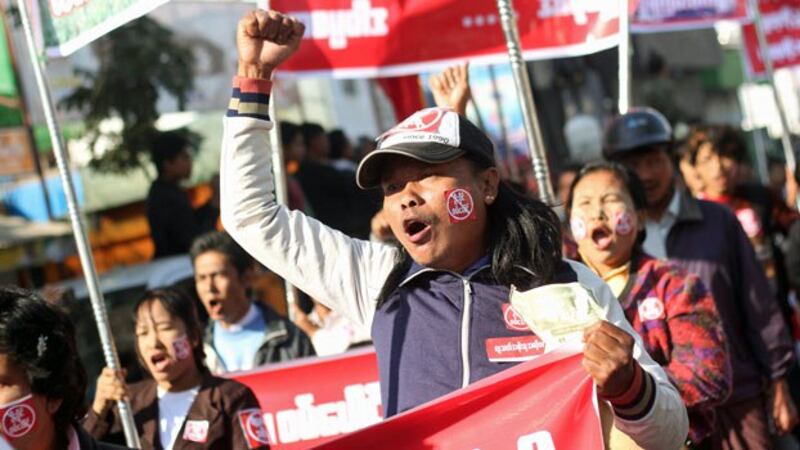 Myanmar protesters shout slogans as they demand the closure of a flashpoint copper mine, near the Chinese consulate in Myanmar's central city of Mandalay, Dec. 27, 2014. The mine, run by Chinese firm Wanbao as part of a joint venture with a major Myanmar military conglomerate, has raised questions about the Southeast Asian nation's reliance on investment from China.