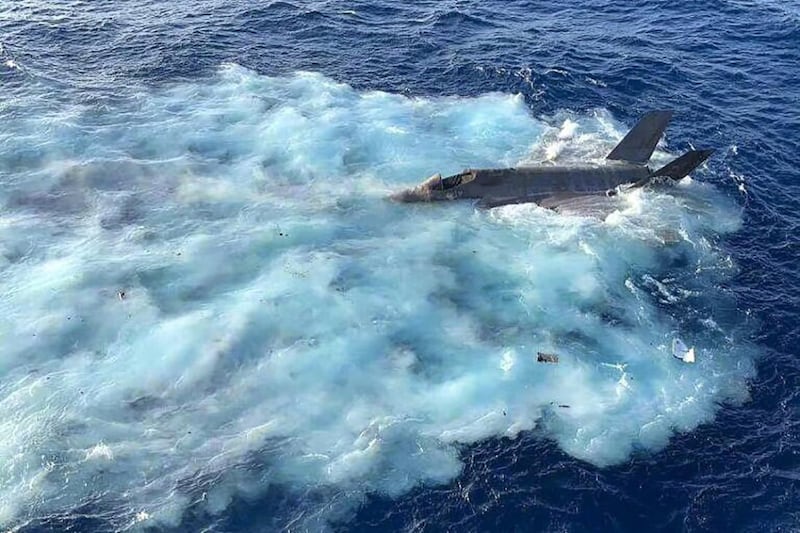 A photo widely circulated on social media shows the F-35C jet in the sea after its crash while attempting to land on the USS Carl Vinson on Jan. 24, 2022. The U.S. 7th Fleet verified the photo. Tweet by @OedoSoldier