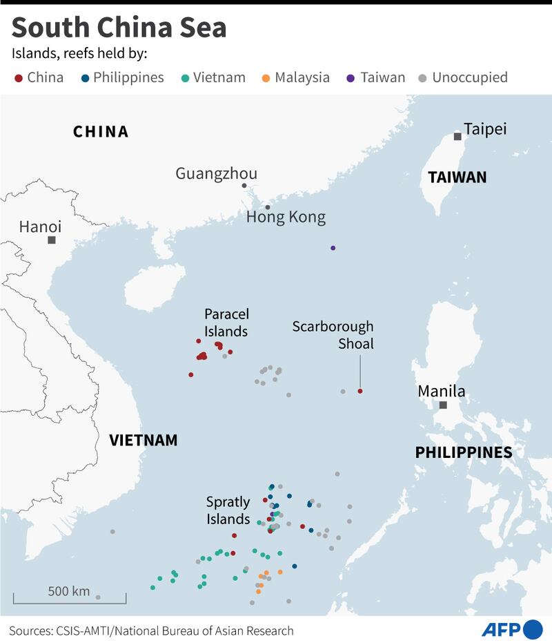 A map showing islands and reefs held by China, the Philippines, Vietnam, Malaysia and Taiwan in the South China Sea.