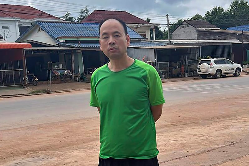 Chinese rights lawyer Lu Siwei on a road, at an undisclosed location north of Vientiane, Laos, July 27, 2023, as he headed south to the border with Thailand. Lu, stripped of his license for taking on sensitive cases, was arrested in Laos. Credit: Anonymous Source via AP