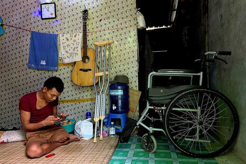 The loss of his leg is a small sacrifice, Ko Phyo says, compared to that of the hundreds killed, including one of his fellow guards, a 15-year-old girl. (REUTERS)