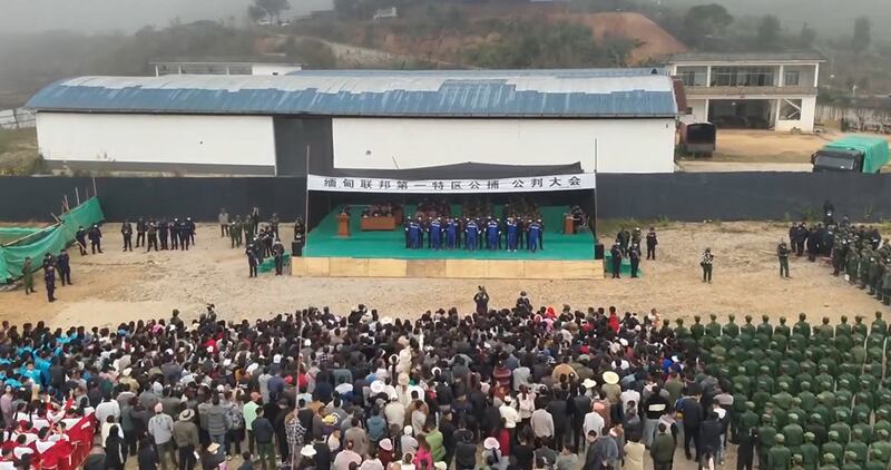 People sentenced by the Myanmar National Democratic Alliance Army are put on stage in front of a crowd in Laukkai town, northern Shan State, Dec. 5, 2024.