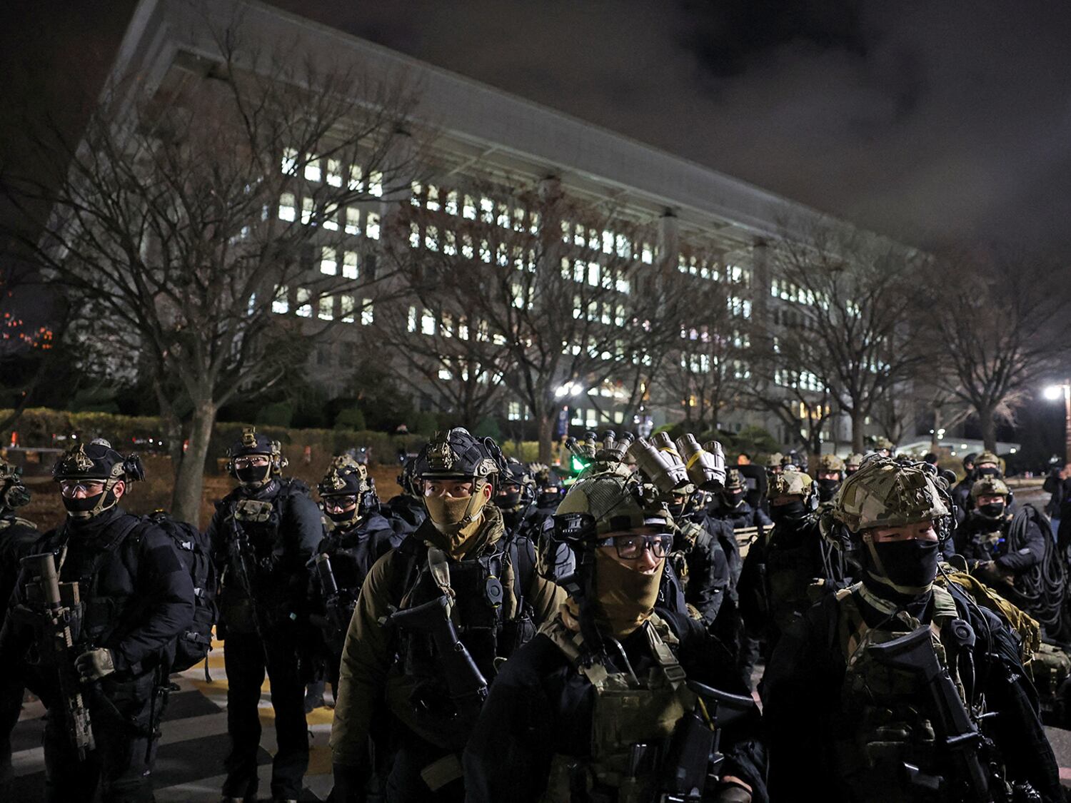 Military forces stand outside the National Assembly, after South Korean President Yoon Suk Yeol declared martial law, in Seoul, Dec. 4, 2024.