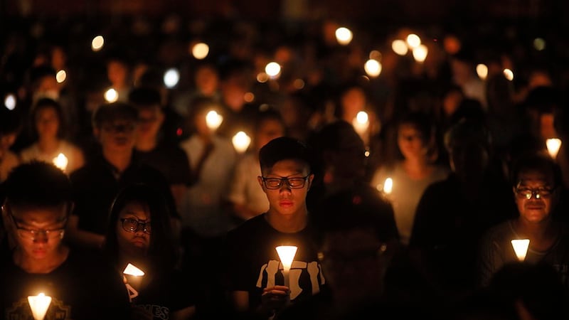 Tens of thousands of people attend an annual candlelight vigil at Hong Kong's Victoria Park, June 4, 2018. Credit: AP Photo