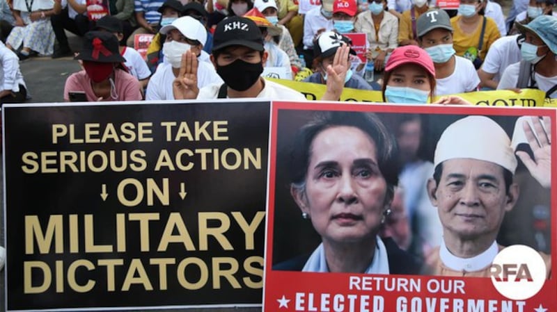 Supporters of Aung San Suu Kyi and U Win Myint protest in Yangon, Feb. 19, 2021. RFA