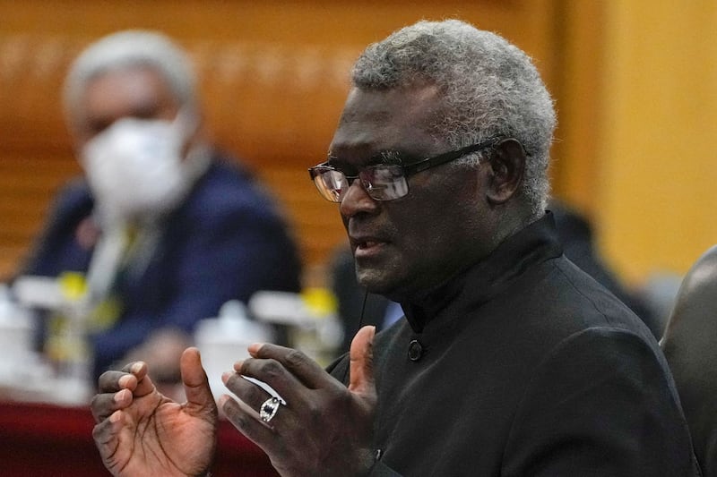 Solomon Islands Prime Minister Manasseh Sogavare speaks during a meeting with Chinese officials at the Great Hall of the People in Beijing, July 10, 2023. (Andy Wong/AP)