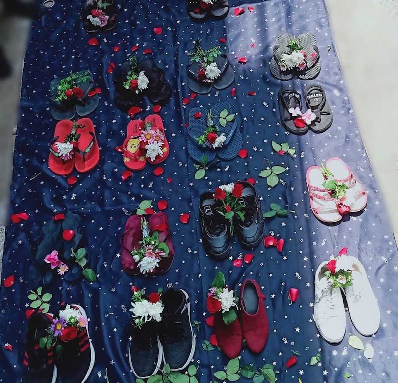 An arrangement of protest shoes is set up in Sanchaung, Yangon. (RFA)