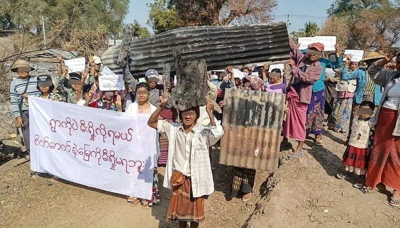 Protesters in Pale township in Myanmar's Sagaing region stage a protest after more than 1,100 houses in four villages were burned to the ground in the past two weeks, Feb. 11, 2022. Credit: Citizen journalist.