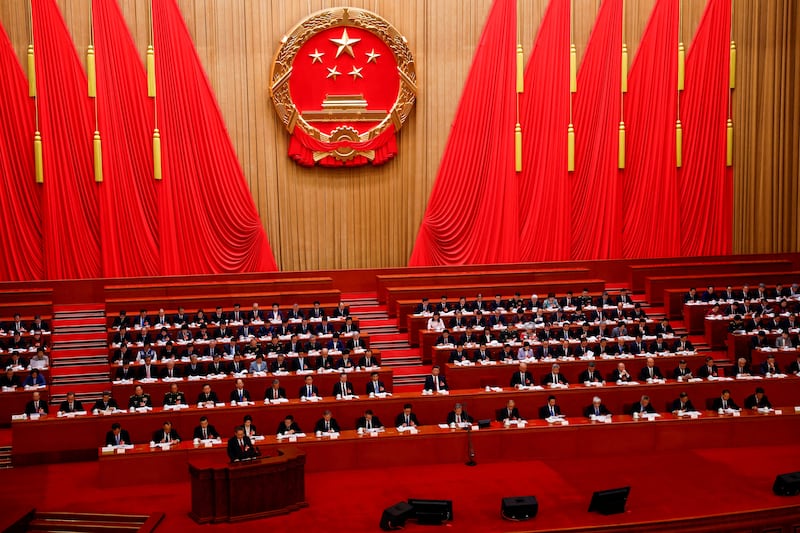 Chinese Premier Li Qiang delivers a speech during the opening session of the National People’s Congress, at the Great Hall of the People, in Beijing, March 5, 2025.