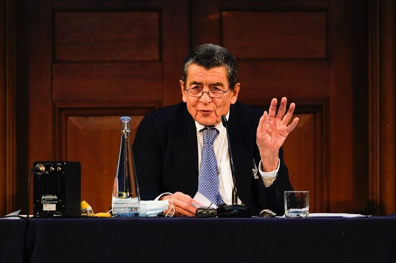 Geoffrey Nice delivers the verdict of the independent tribunal assessing evidence on China's alleged rights abuses against the Uyghur people, Dec. 9, 2021. Credit: AP