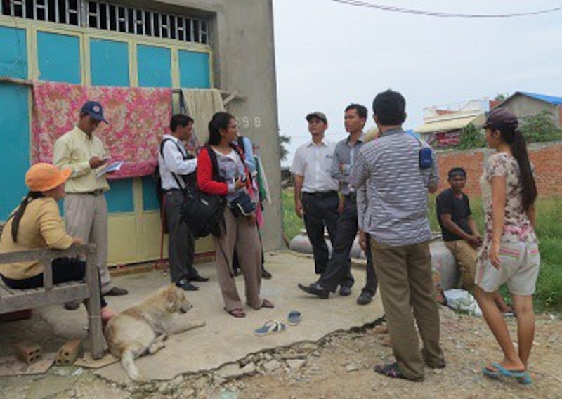 Representatives from local rights groups investigate the detentions, Nov. 15, 2012.